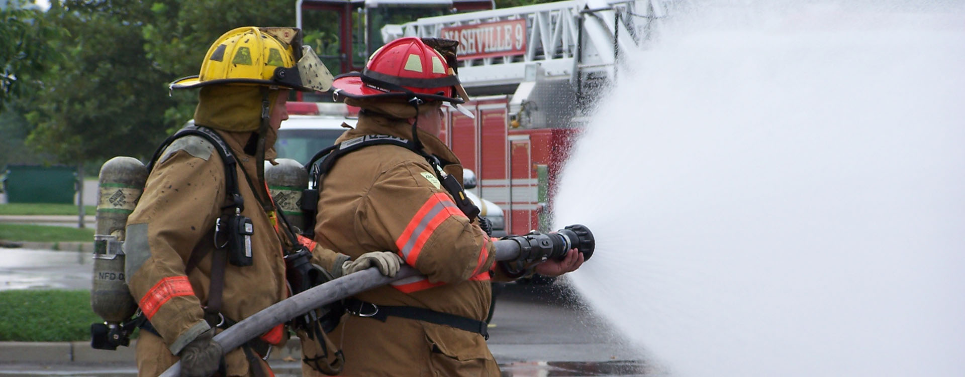 firemen spraying water