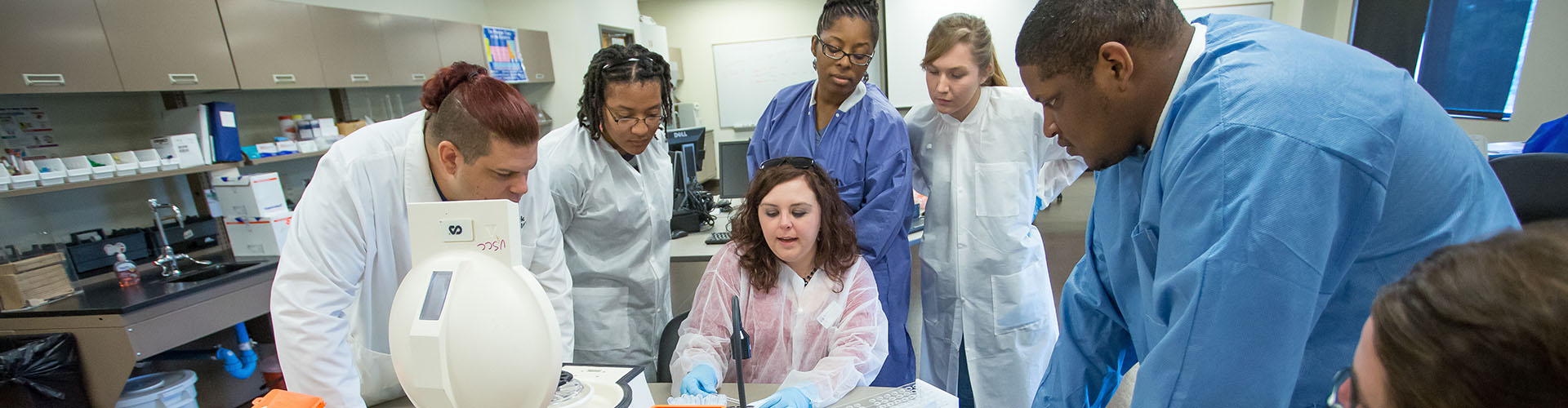health sciences students in a lab