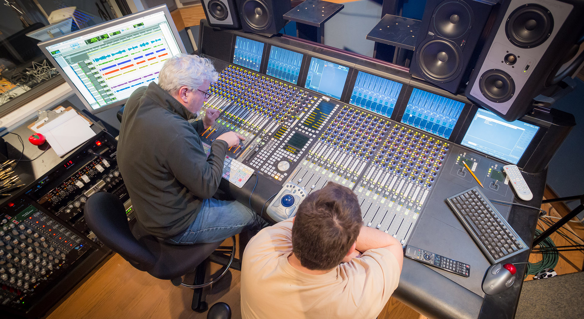 two people working in a recording studio